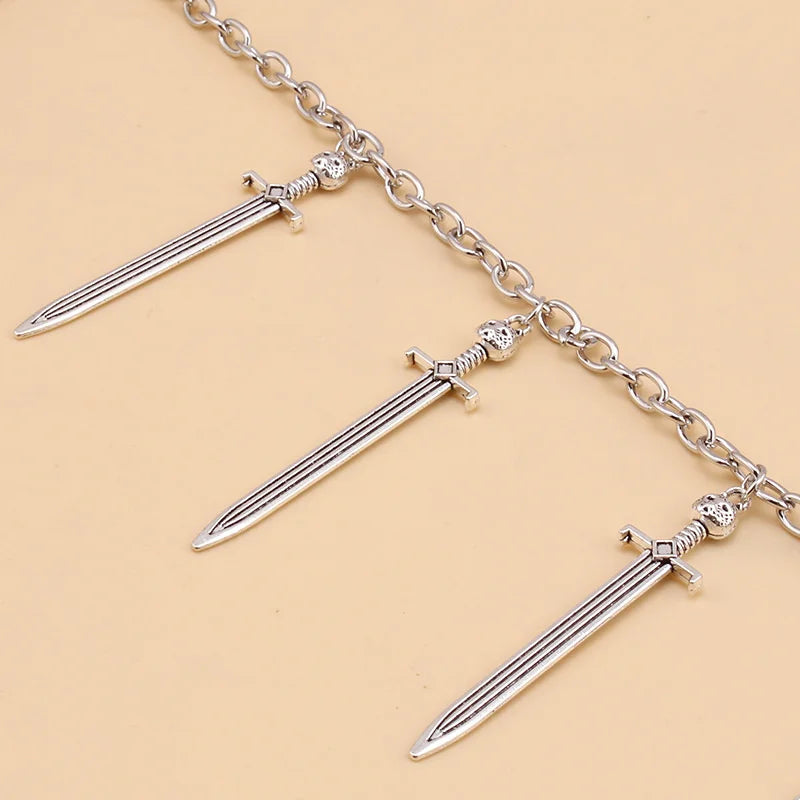 Triple cadena con espadas
