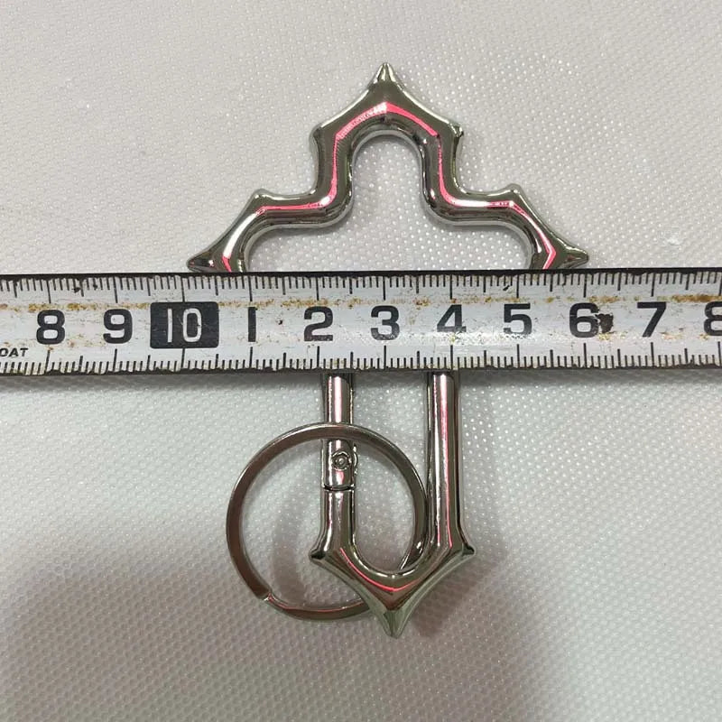 Mosquetón en forma de cruz