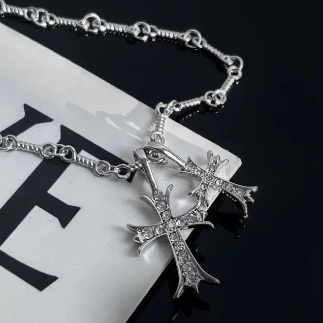 Collar de doble cruz con brillantes