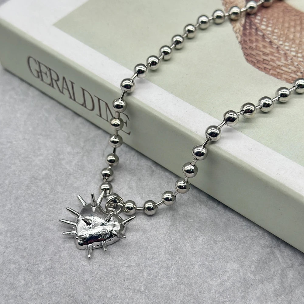 Collar de corazón con pinchos cadena de bola gruesas